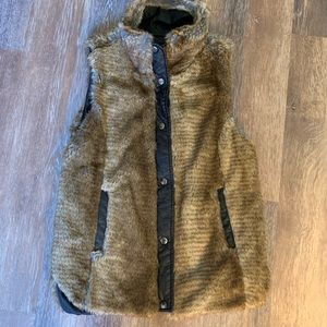 Bagatelle faux fur vest with faux leather trim.